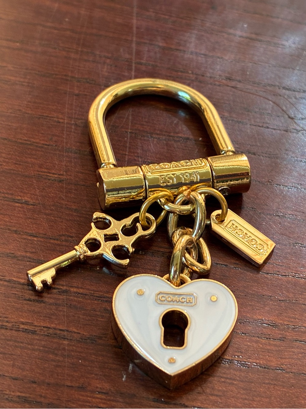 Coach Gold-tone Keyring with White Enamel Heart Lock